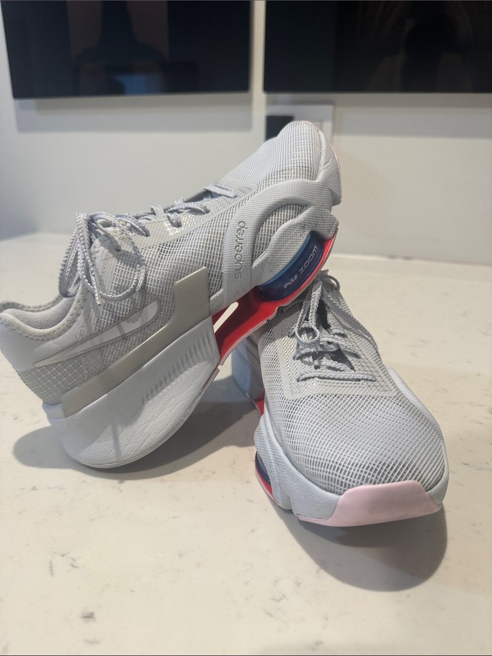 Nike Women's Grey Mesh Athletic Sneakers with Pink and Blue Accents